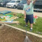 Nick in the garden giving thumbs up